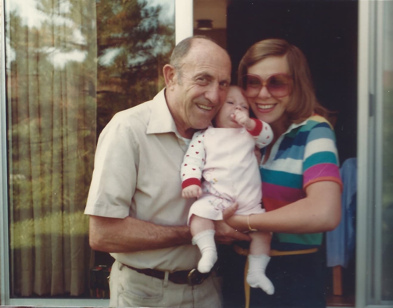 Beautiful family memory - grandparents with baby